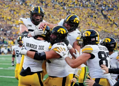 TIME BANDITS: Brown-to-Vander Zee on final play lifts No. 17 past No. 18 Michigan 20-19